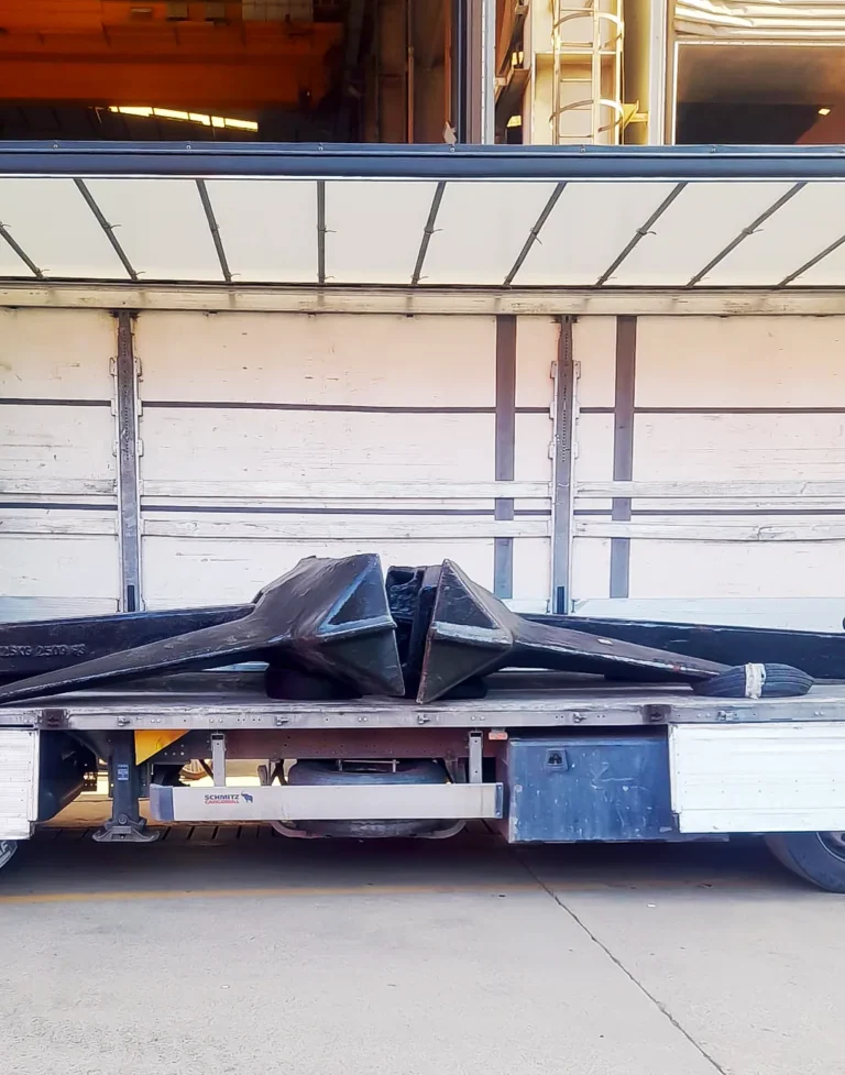 ship anchors loaded on flatbed truck