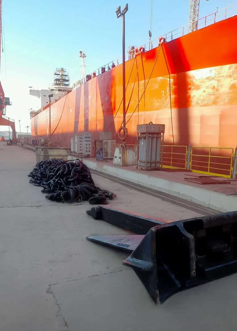vessel in drydock with new anchors and chains